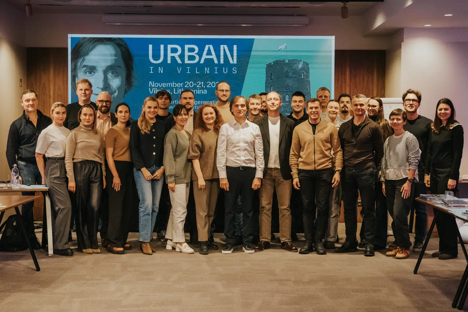Participants of the Urban in Vilnius course, November 2025, gathered in front of the event banner